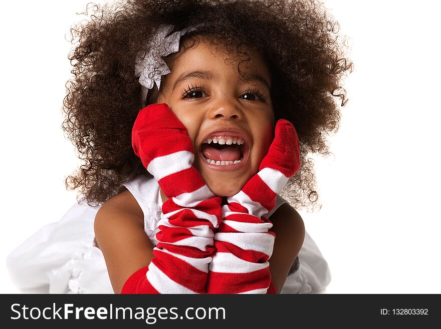 Portrait of a preschool child girl laying down. Studio shot. Isolated