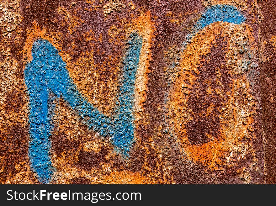 Text no on the dirty old wall in an abandoned ruined Metal plate texture and background