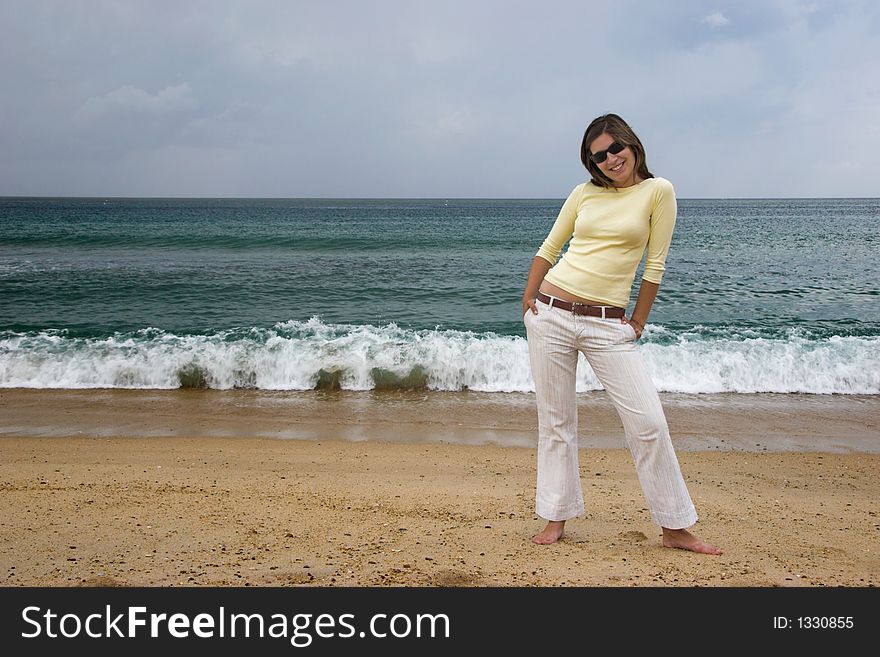 Beautiful woman posing in the beach. Beautiful woman posing in the beach