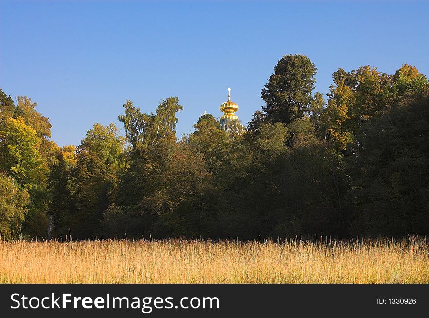 Field near christian church in New Jerusalem near Istra, Moscow region, Russia