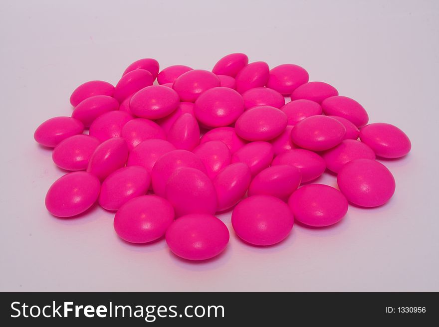 Some pink medication pills - anti-inflamatories for back pain. Some pink medication pills - anti-inflamatories for back pain