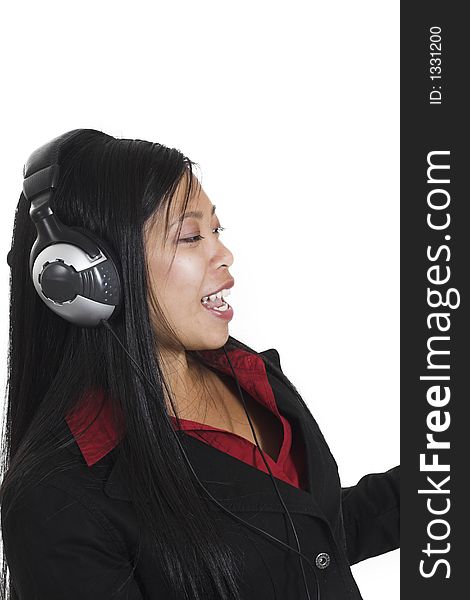 Woman listening to music over white background