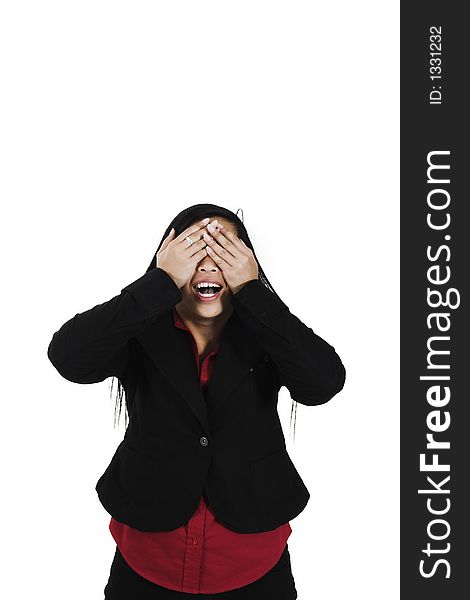 Woman covering her eyes over white background