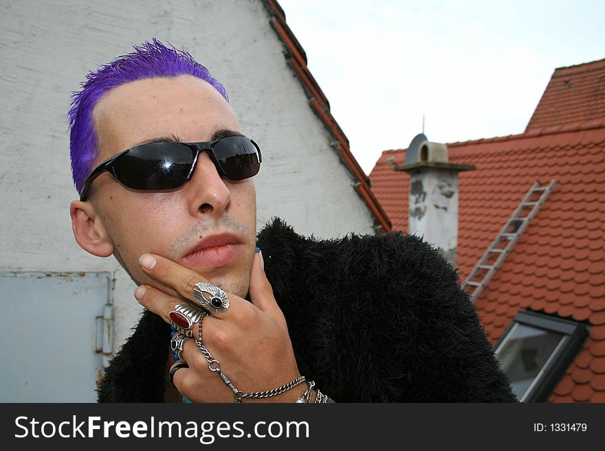 Pensive punk with purple hair