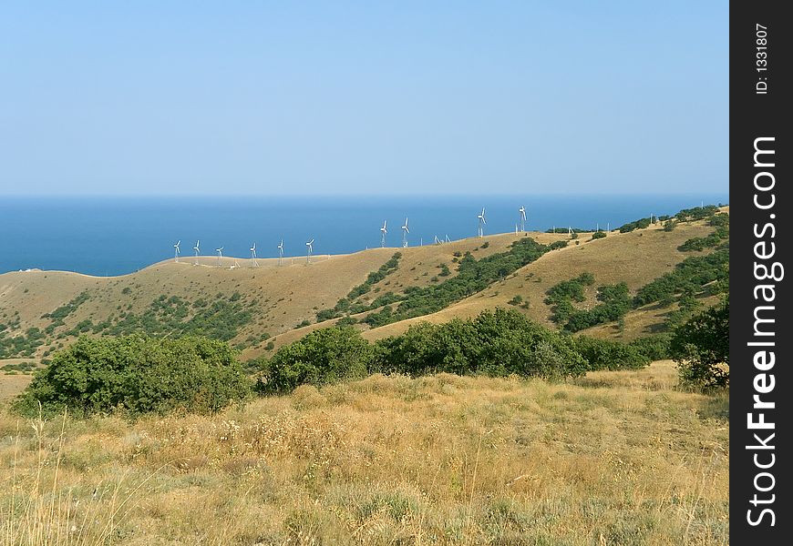 Windmachines on coast of sea