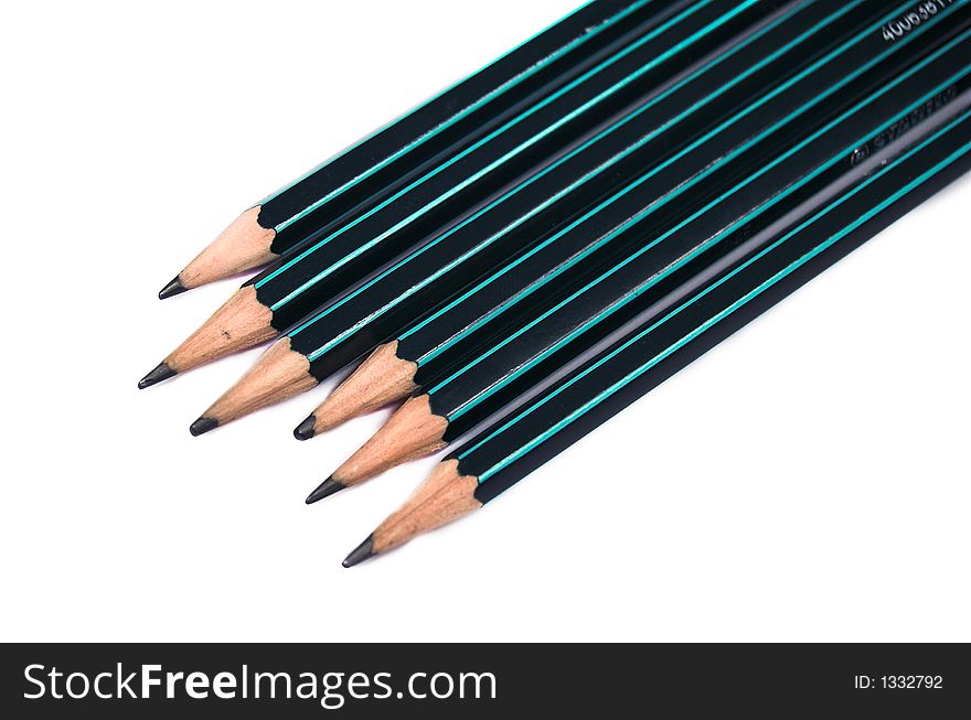 Six pencils on white background