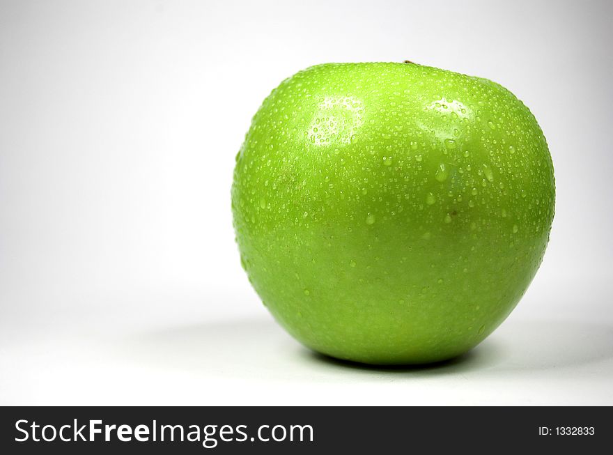 Green apple on white background