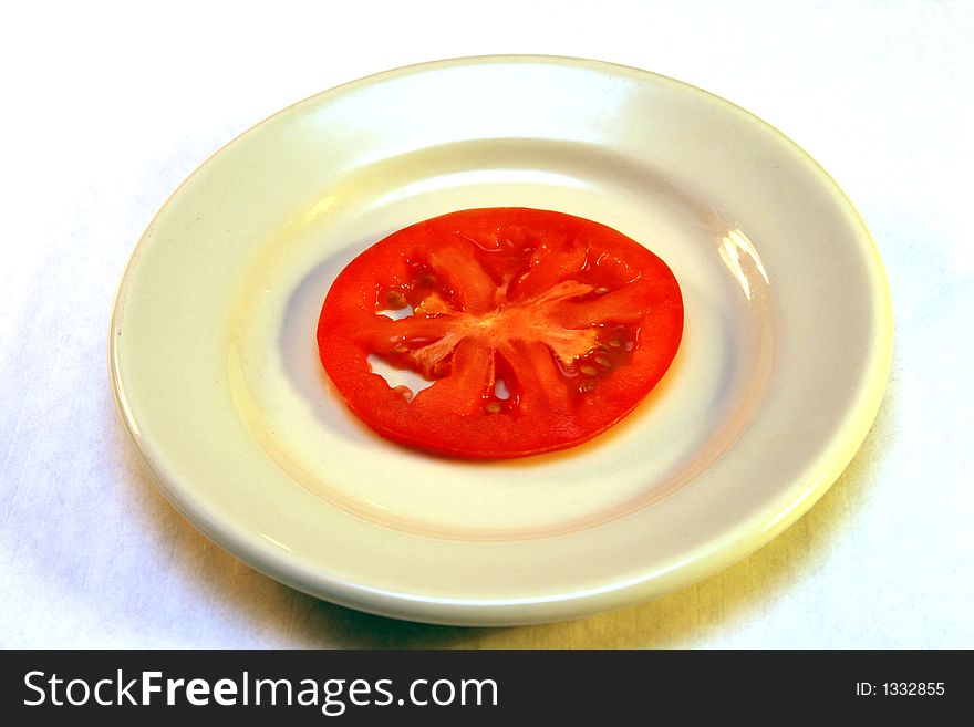 Tomato slice in a plate
