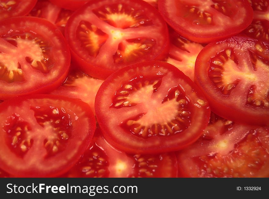 Red tomatoes on white background