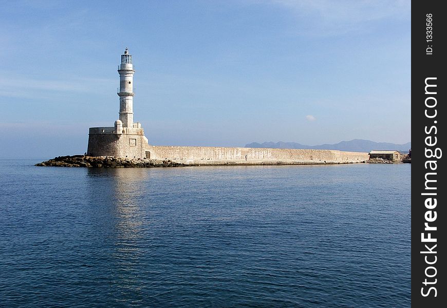 The recently renovated (Spring 2006) Venetian lighthouse standing at the entrance of the historic harbour of Hania, Crete. The recently renovated (Spring 2006) Venetian lighthouse standing at the entrance of the historic harbour of Hania, Crete