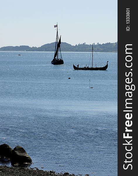 Picture of viking ship at sea near coast. Celebration of memory to battle of Hafrsfjord in the year 872, when Harald Hårfagre  (Fairheaded Harald) united Norway into one kingdom.