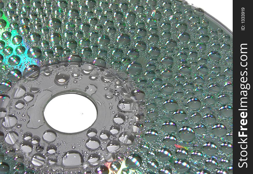 Water drops on a surface of compact disc. Water drops on a surface of compact disc