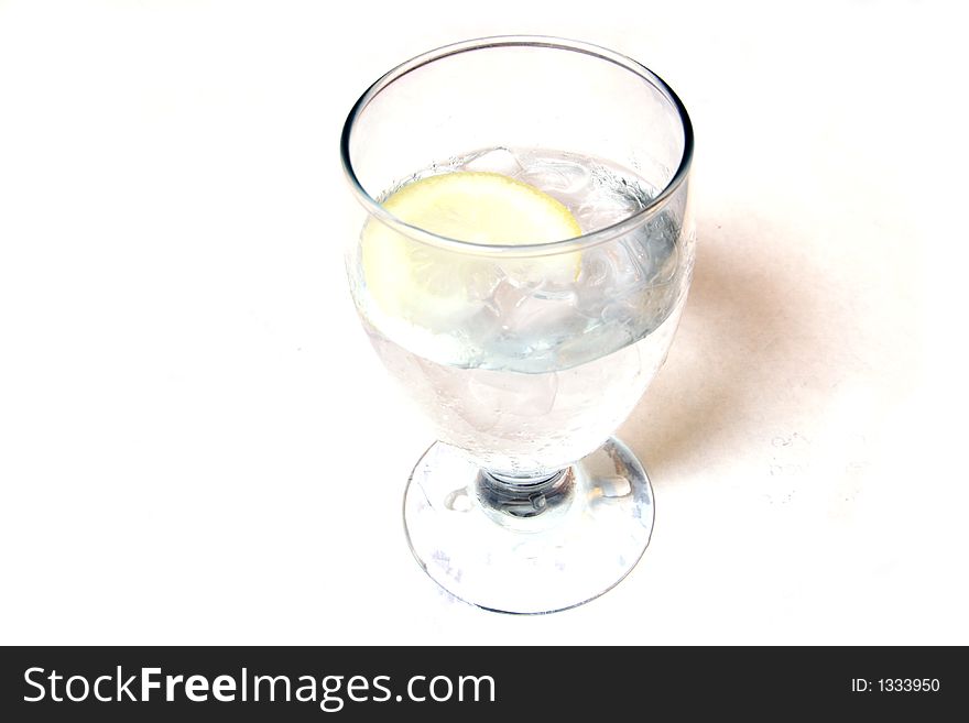 Glass of water with a slice of lemon