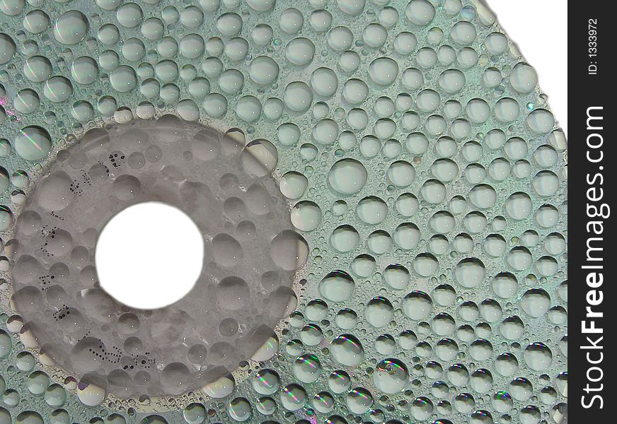 Water drops on a surface of compact disc. Water drops on a surface of compact disc