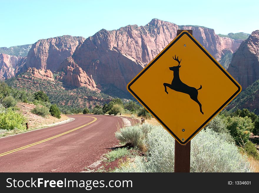 Deer road sign and breathtaking mountains. Deer road sign and breathtaking mountains