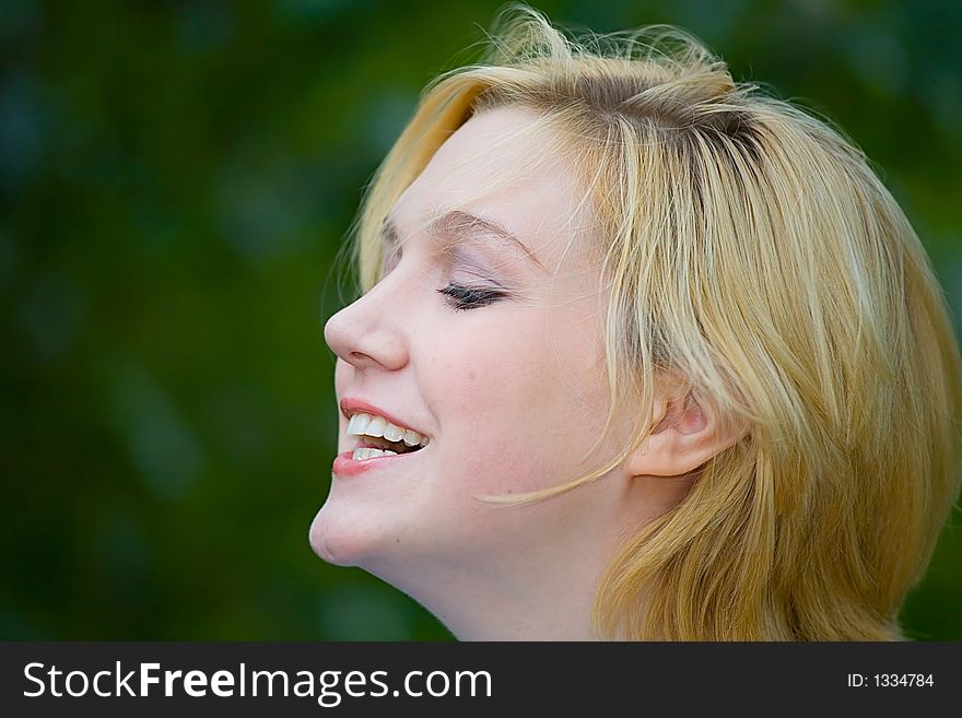 Beautiful Yong Blonde Girl With Blue Eyes