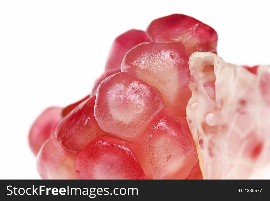 Close up macro shot of pomegranate seeds. One of the superfoods that can lower cholesterol. Close up macro shot of pomegranate seeds. One of the superfoods that can lower cholesterol