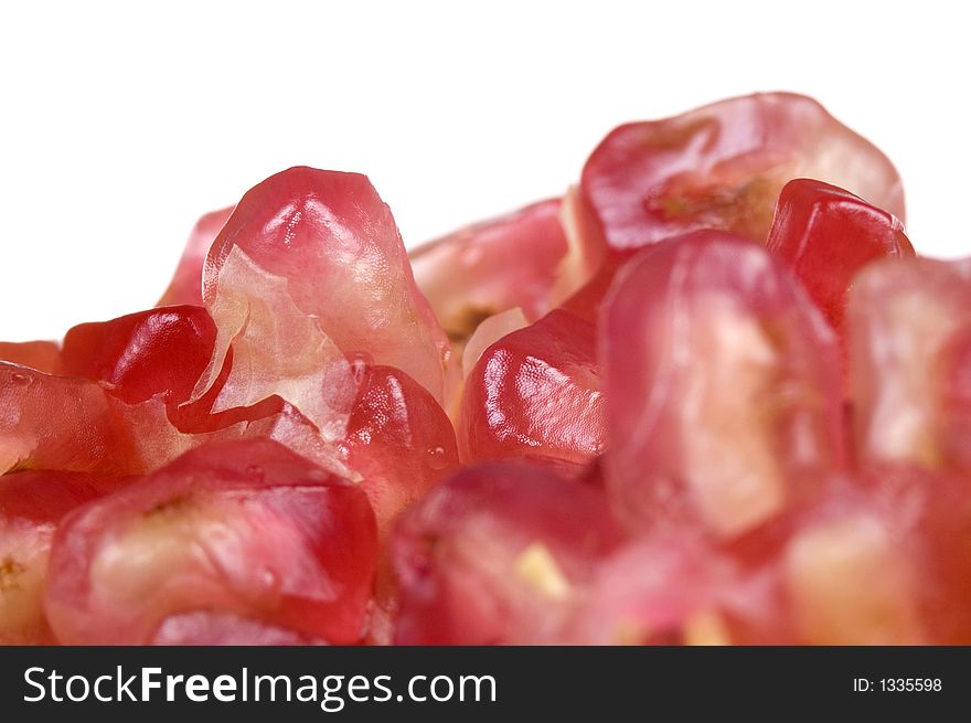 Close up macro shot of pomegranate seeds. One of the superfoods that can lower cholesterol. Close up macro shot of pomegranate seeds. One of the superfoods that can lower cholesterol