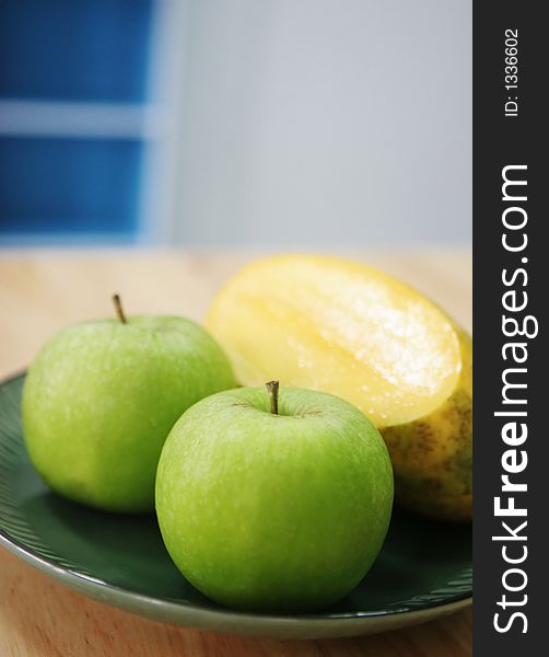 Luscious fresh fruit - green apples and mango