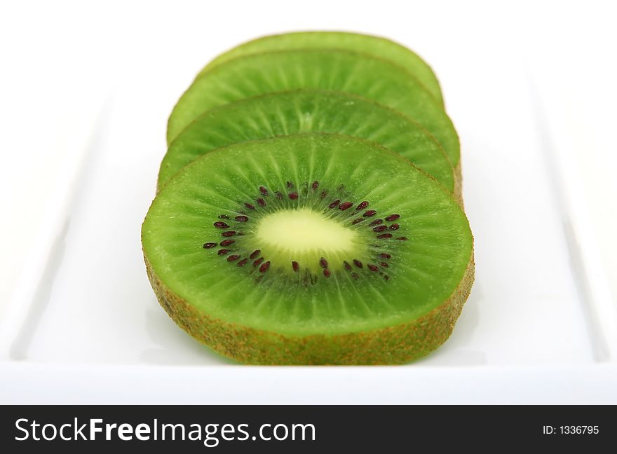 Tropical green kiwi fruit, isolated, closeup