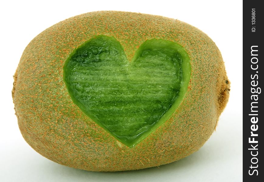 Tropical romantic love heart kiwi fruit, isolated, closeup. Tropical romantic love heart kiwi fruit, isolated, closeup