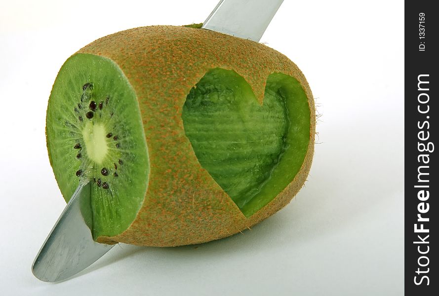 Tropical romantic love heart kiwi fruit, isolated, closeup. Tropical romantic love heart kiwi fruit, isolated, closeup