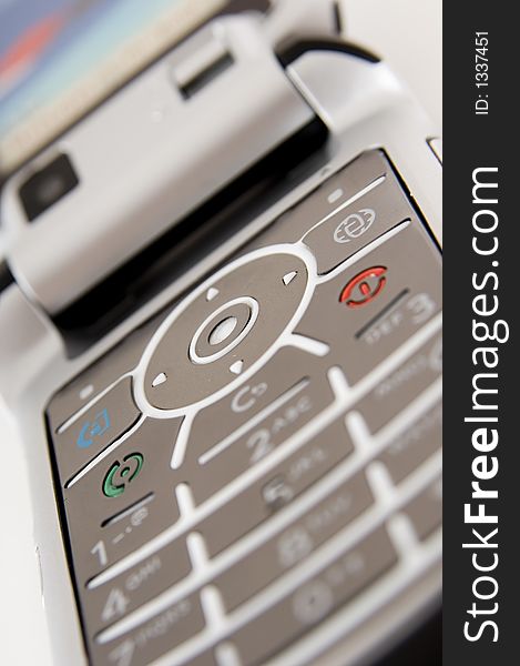 A close-up shot of a mobile phone's keypad. A close-up shot of a mobile phone's keypad