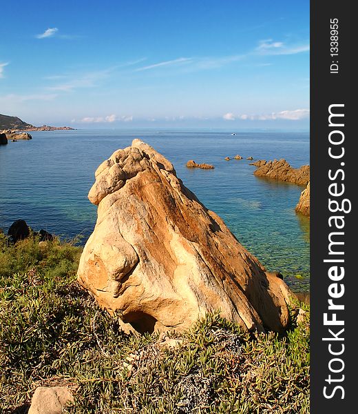 A strange rock on a beach in Sardinia (Italy). A strange rock on a beach in Sardinia (Italy)