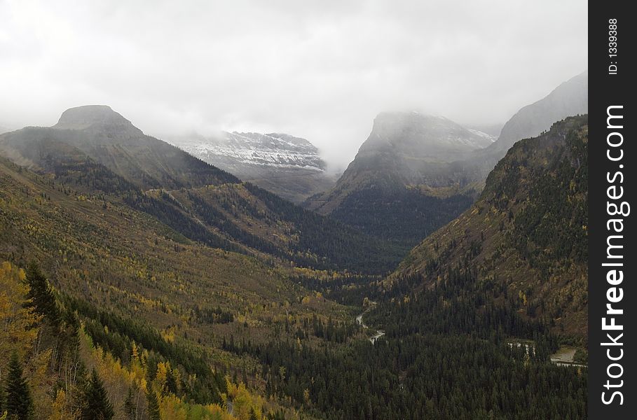 This image of the fall colors and the mountains with snowshowers in the background was taken in Glacier National Park. This image of the fall colors and the mountains with snowshowers in the background was taken in Glacier National Park.