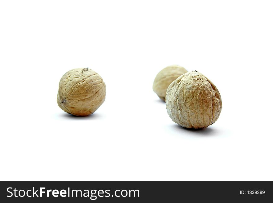 Three walnuts isolated on white