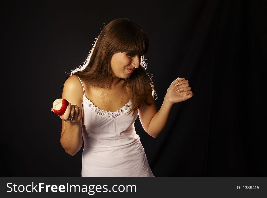 Healthy woman posing with apple. Healthy woman posing with apple
