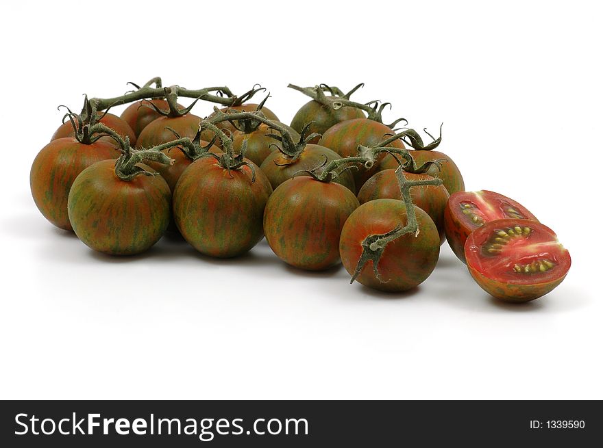 Bunch of zebra tomatoes isolated on a white background. Bunch of zebra tomatoes isolated on a white background