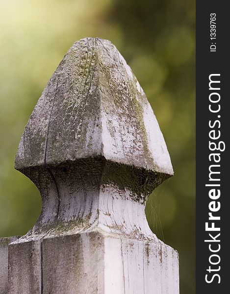 Shallow focus closeup of a fence post.