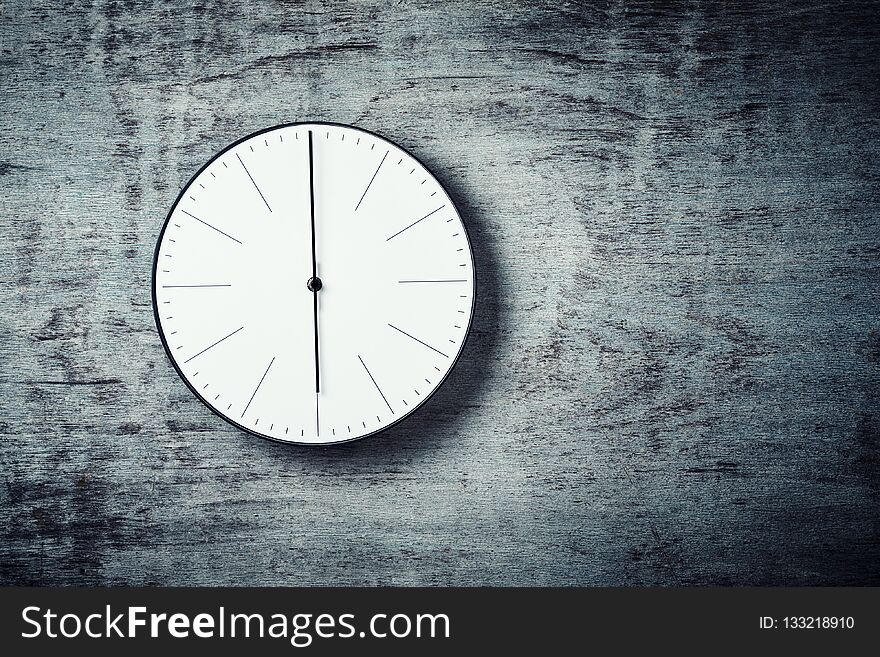 Classic Round Wall Clock On A Wooden Background With Copy Space