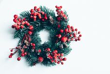 Christmas Decorative Wreath Of Holly, Ivy, Mistletoe, Cedar And Leyland Leaf Sprigs With Red Berries Over White Background Royalty Free Stock Images
