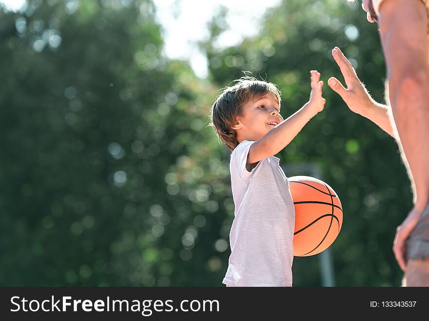 Happy Boy With A Ball