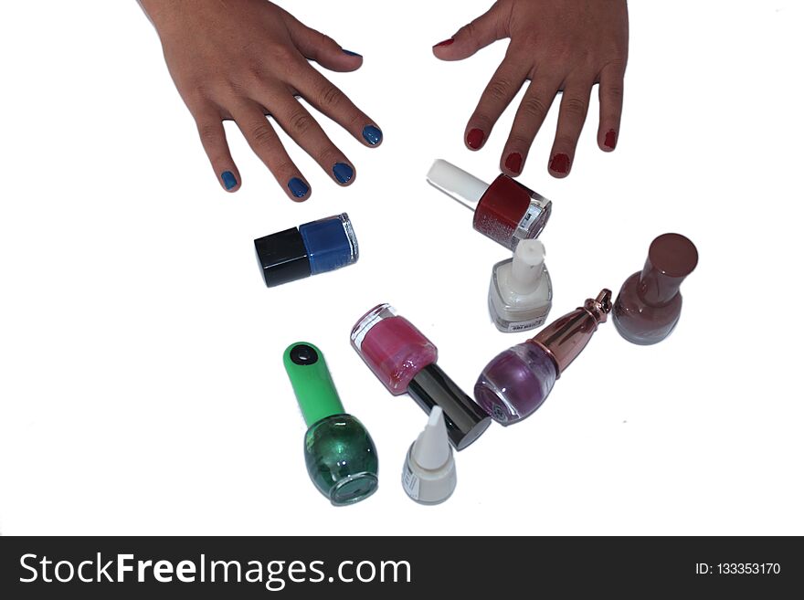 Girl with colorful nailpolish in hand. Girl with colorful nailpolish in hand