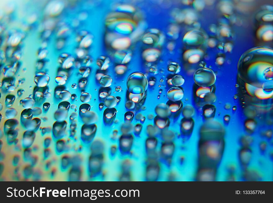 Abstract art with Water droplets on a colorful surface