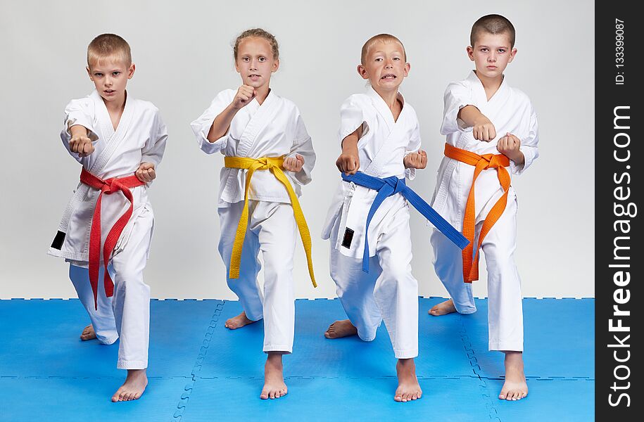 Children in karategi beats blows. Children in karategi beats blows