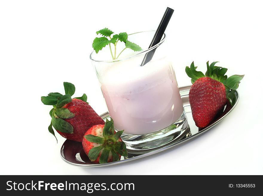 Strawberry shake with fresh strawberries on a white background