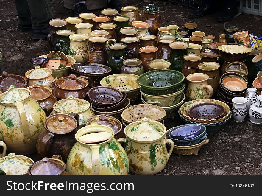 Ceramic pots for sale in a market in Romania. Ceramic pots for sale in a market in Romania