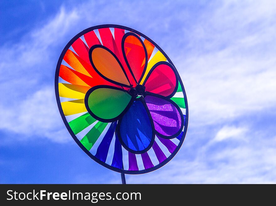 Rainbow lgbt pride spinning pinwheel. Symbol of sexual minorities, gays and lesbians.