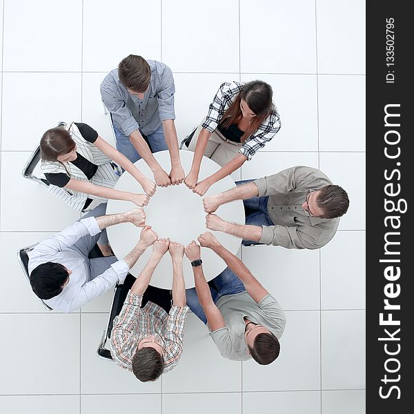 Top view.professional business team showing its unity.the concept of teamwork