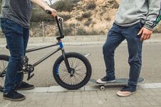 Young People With Skateboard And Bmx Bike. Extreme Urban Sports Concept Royalty Free Stock Photo