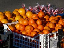 Outdoor Fruit Market Detail With Bright Orange Mandarins Stock Image