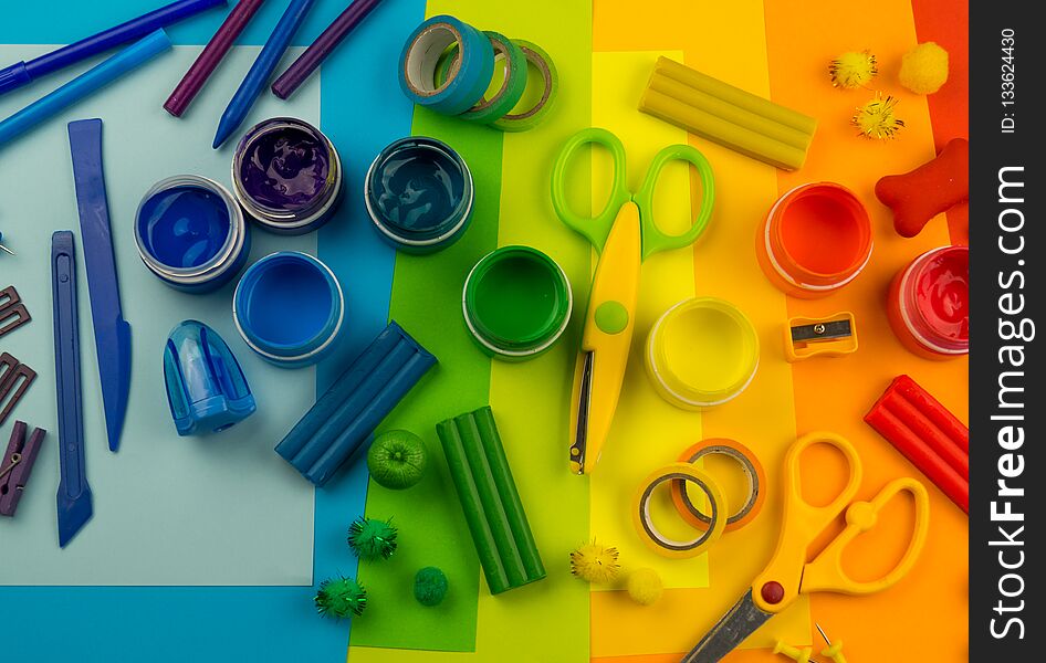 School Accessories Are Laid Out In The Form Of A Rainbow. Black Background