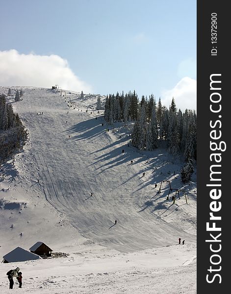 Winter landscape with people skiing. Winter landscape with people skiing