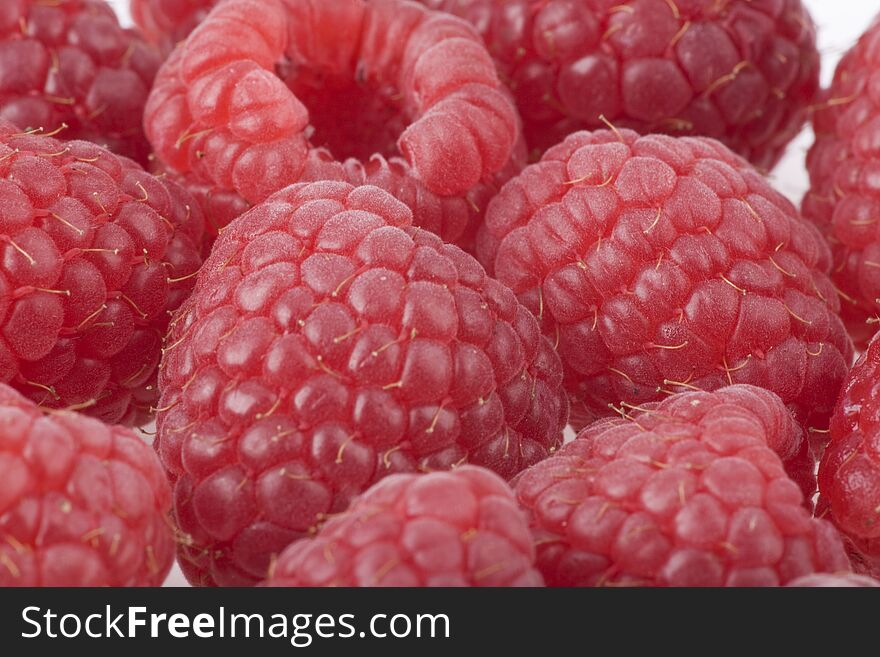 Background with a considerable quantity of a raspberrys. Background with a considerable quantity of a raspberrys