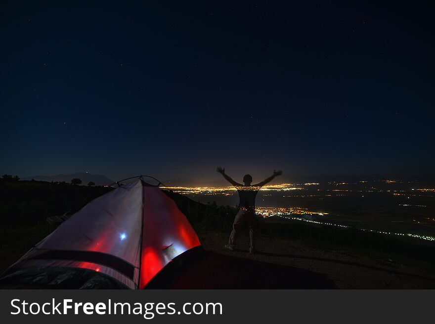 Watching The City From The Hill And Camping