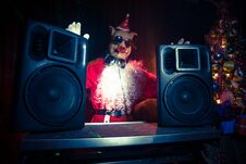 Dj Santa Claus At Christmas With Glasses And Snow Mix On New Year S Eve Event In The Rays Of Light Royalty Free Stock Photos